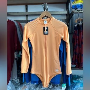Body Glove Chanel paddle suit large the color is loquat